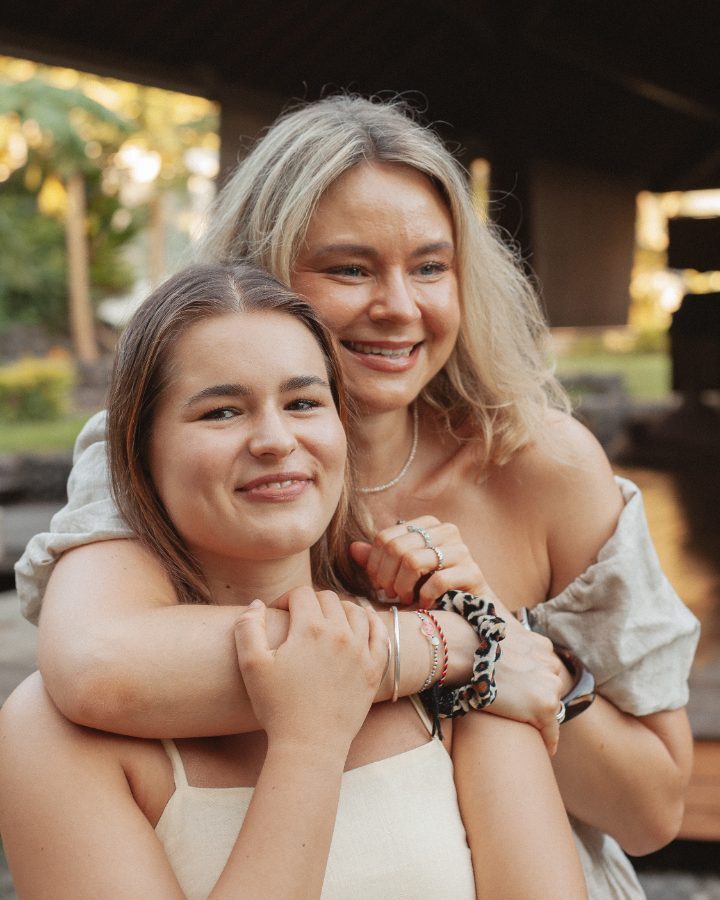 Two friends embracing after training