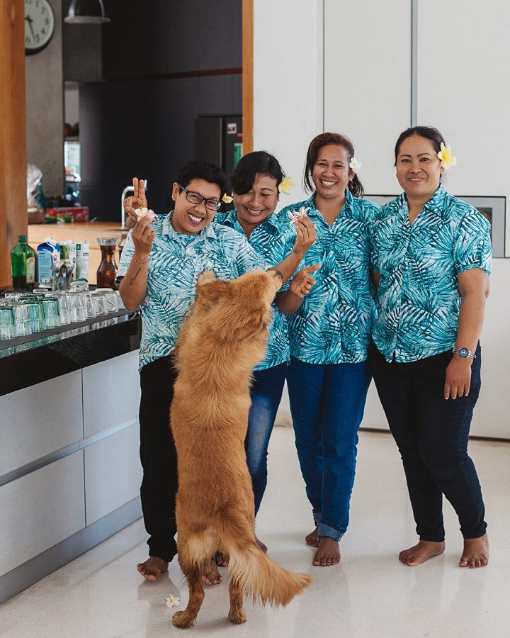 Kitchen staff with the resident dog